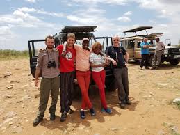 Jeremy group photo with son and other volunteers